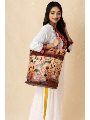 Hand-embossed Shantiniketan leather bag in brown by TANN IN
