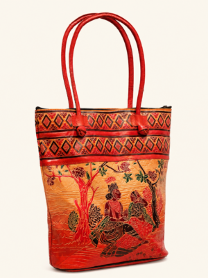 Angled view of red Shantiniketan Radha–Krishna tote