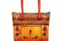 TANN IN Durga motif genuine leather tote bag for women in orange and red with lotus borders and shoulder handles